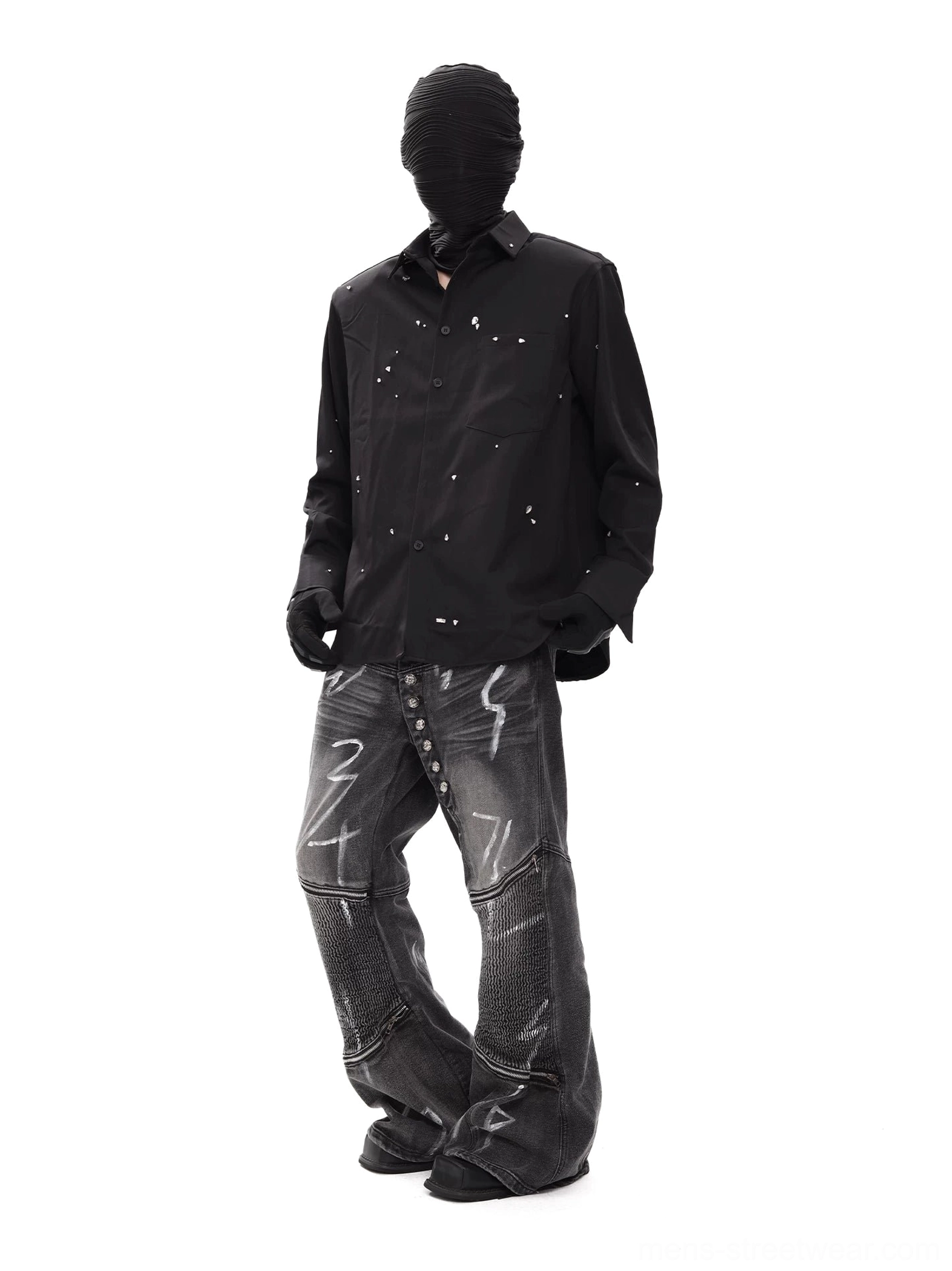 Side front view of black graphic splatter button up shirt styled with wide leg denim pants in a modern Seoul streetwear outfit