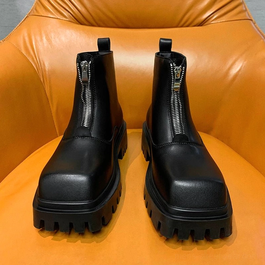 Black square-toe front-zip platform boots with a smooth leather-look upper and exaggerated rubber lug outsole