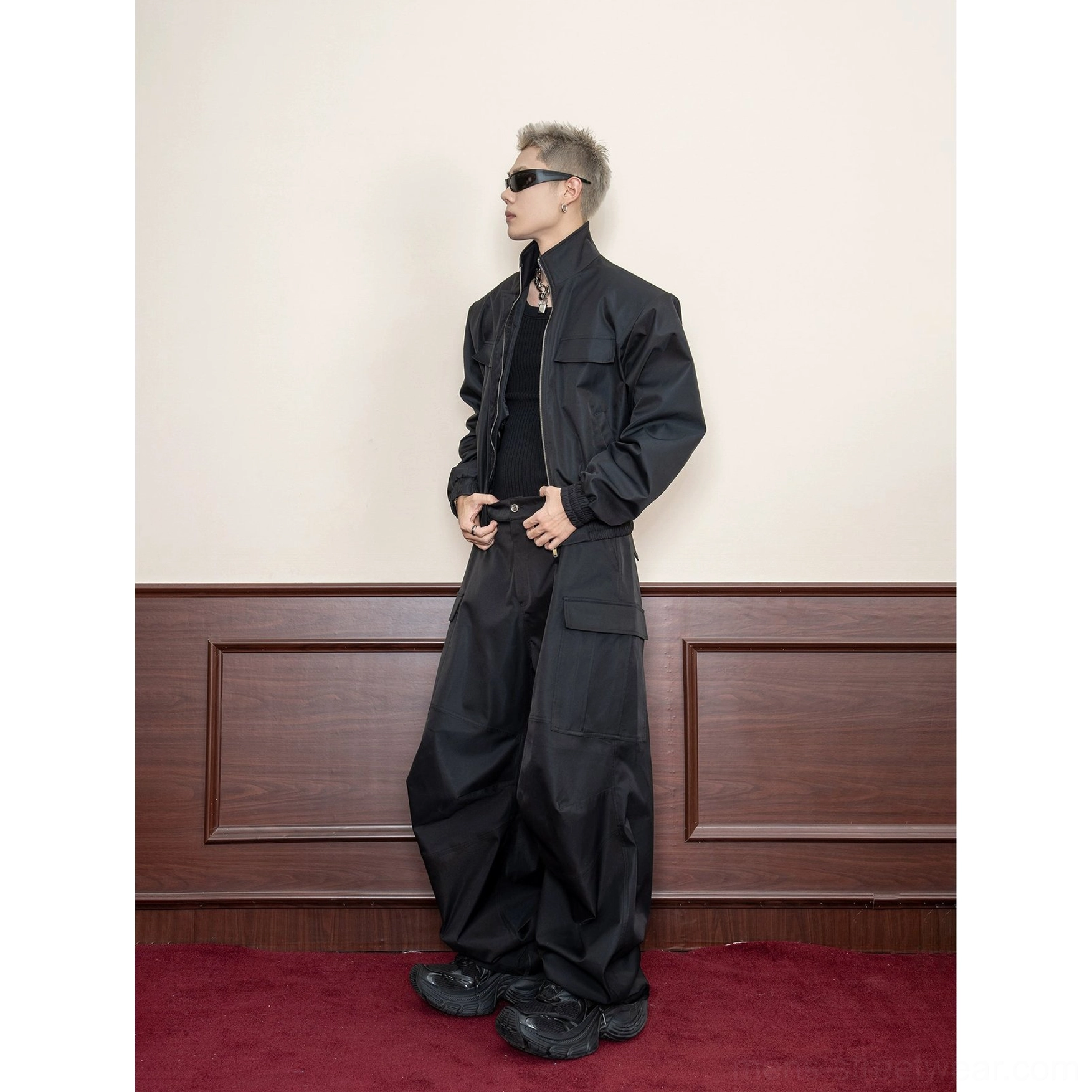 Black stand collar utility jacket right side view with cropped fit smooth matte fabric and relaxed streetwear styling
