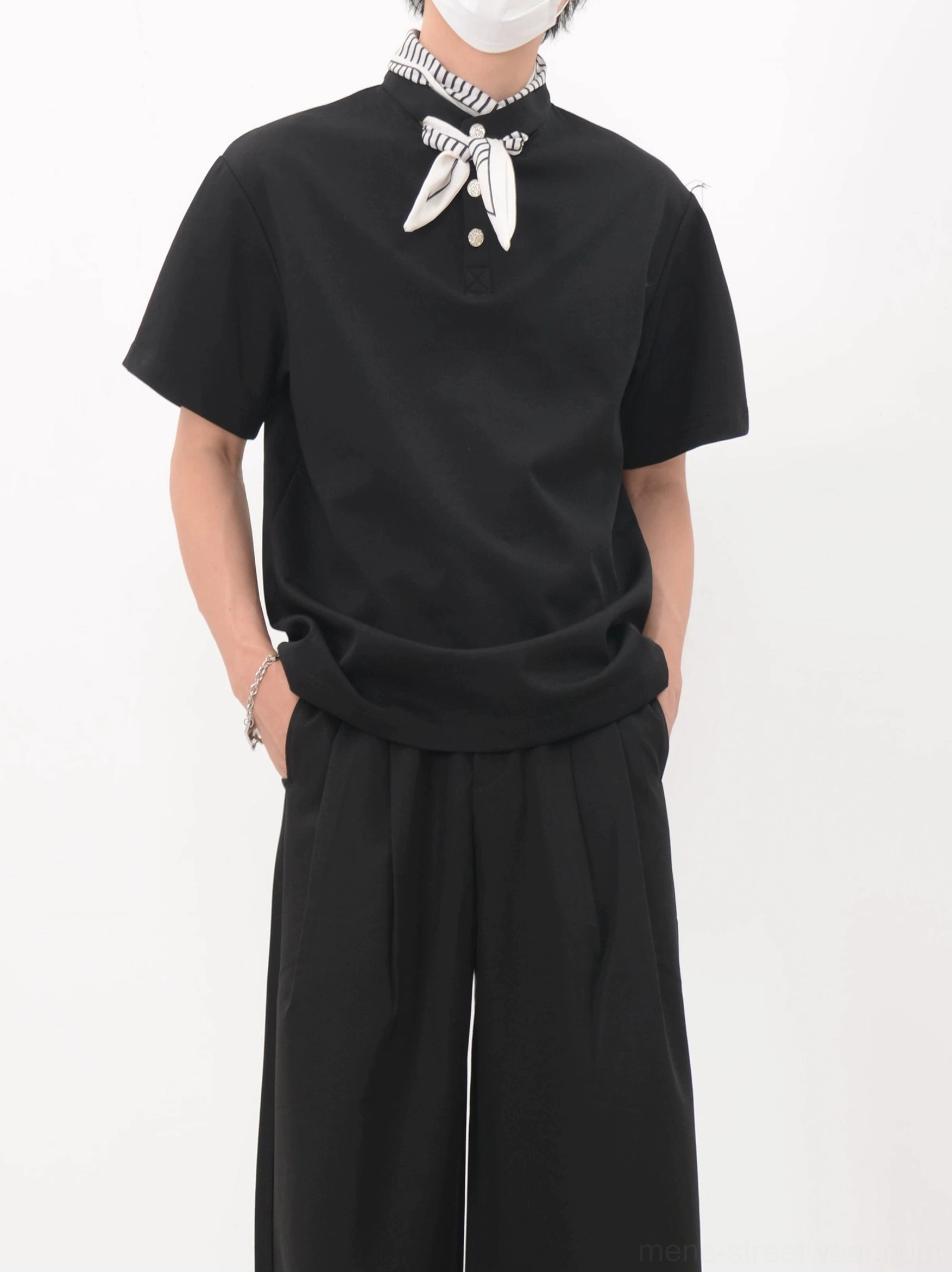 Black striped neckerchief polo tee styled with wide-leg trousers for a modern Seoul fashion streetwear outfit