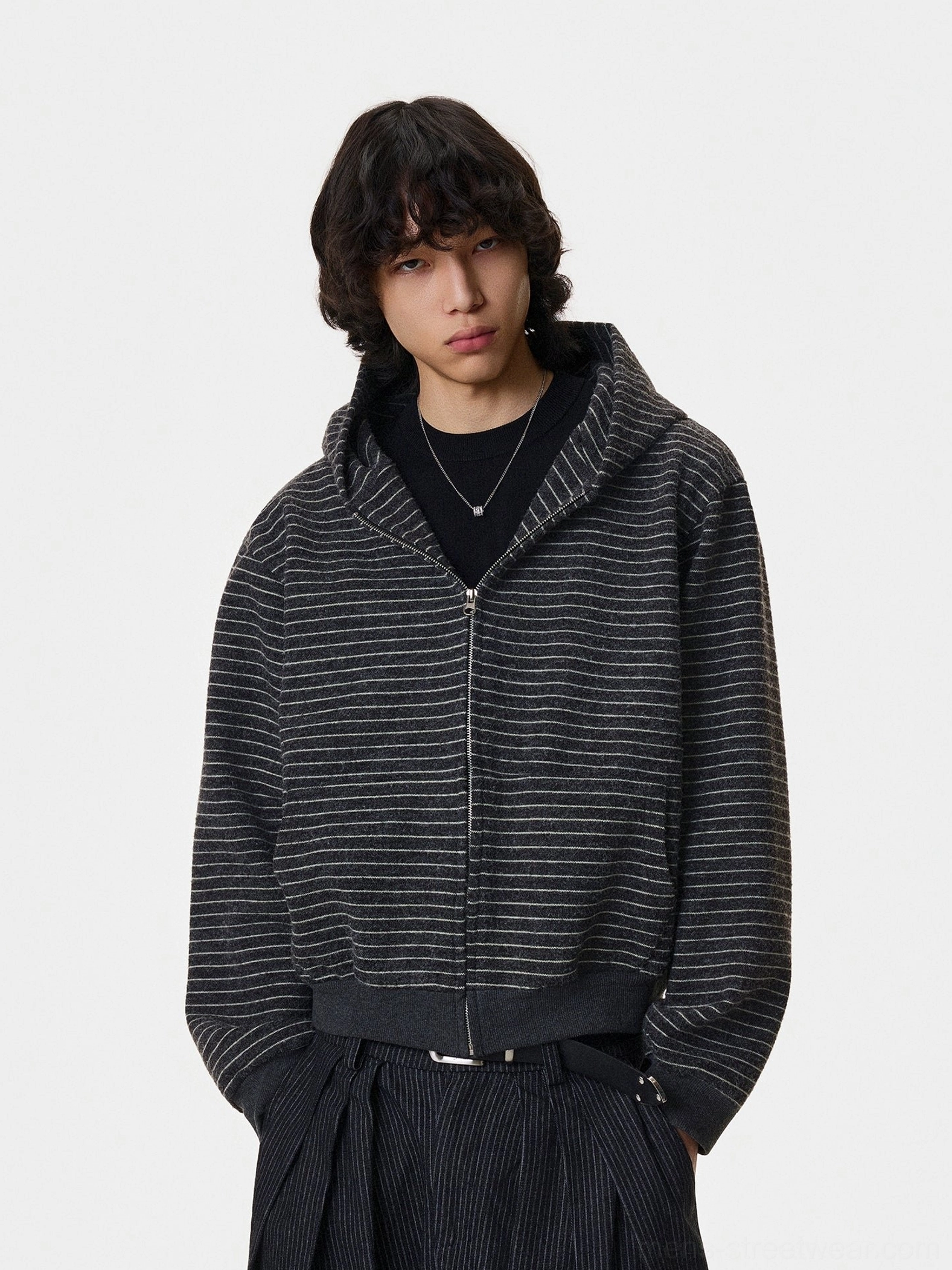 Black striped slouch zip hoodie fully zipped with silver fox fur trimmed hood and relaxed streetwear fit