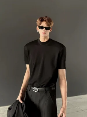 Black structured mock neck tee for men shown in a full-body front view with a slim streetwear silhouette and modern Seoul-inspired styling