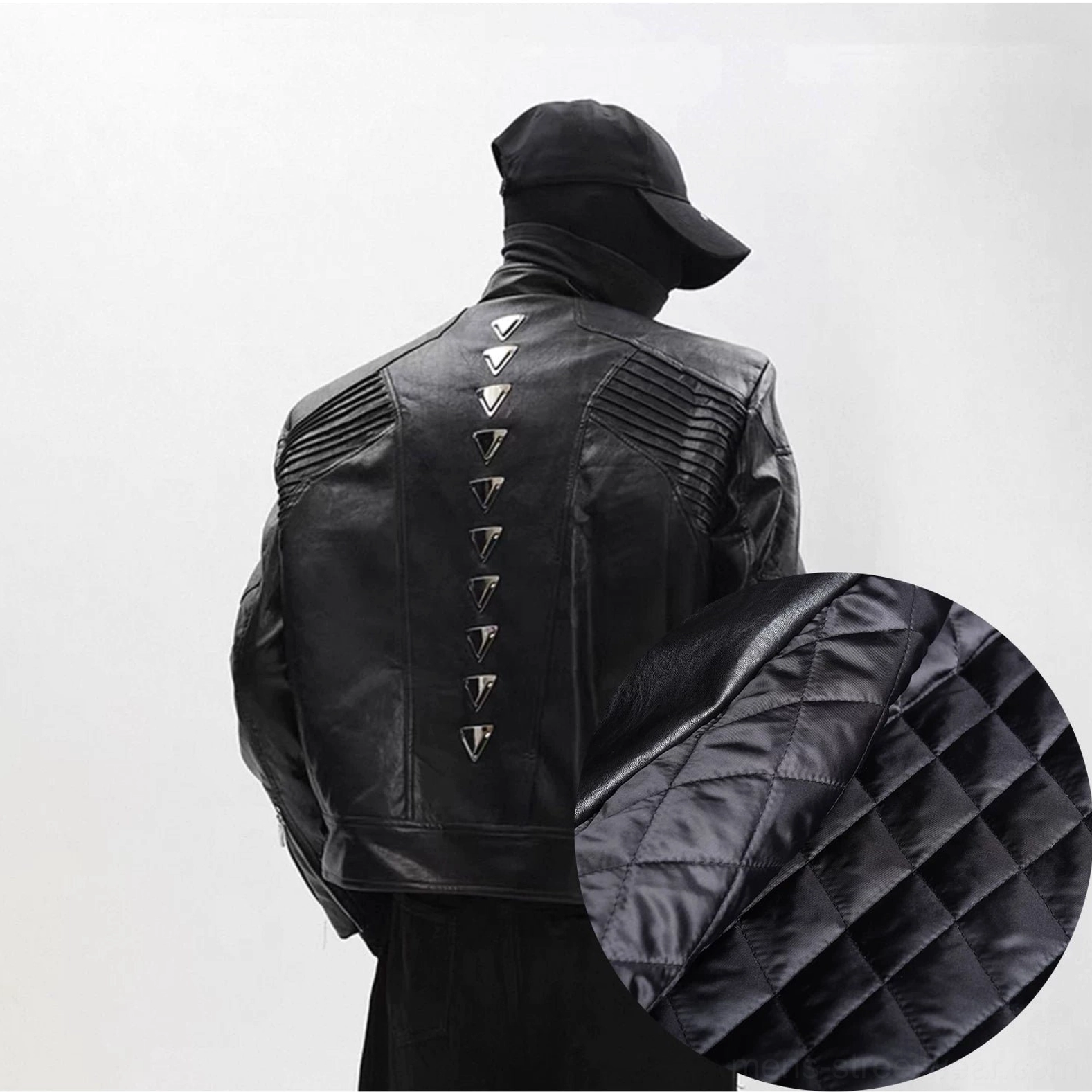 Black studded faux leather moto jacket with black quilted fleece lining and cyberpunk back hardware