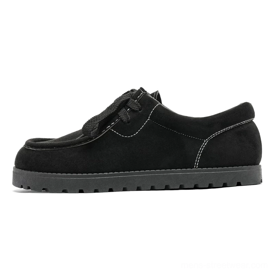 Black suede square-toe lace-up streetwear shoes with contrast white topstitching, moc toe, and thick black ridged rubber outsole