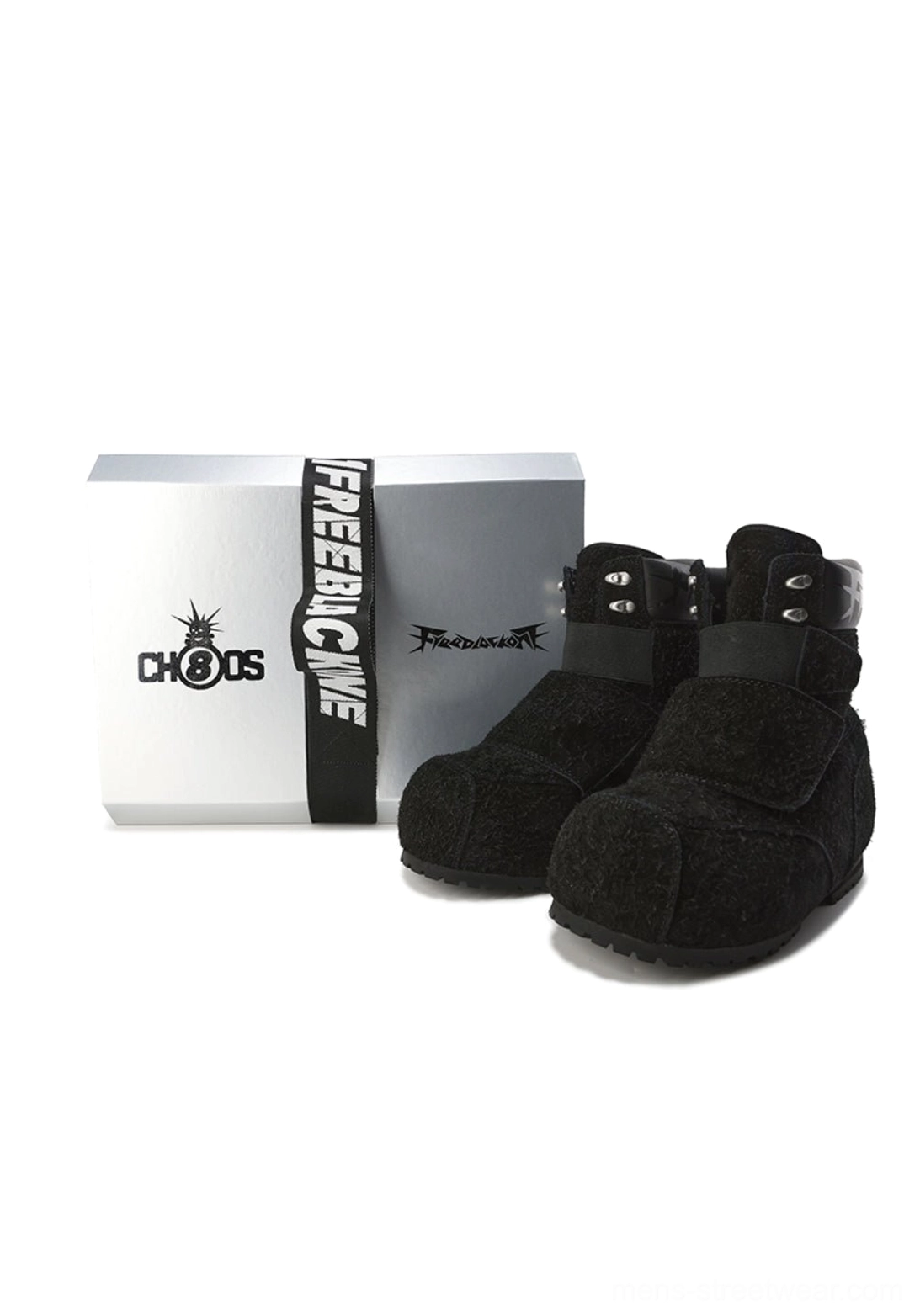 Black suede strap platform winter boots displayed beside retail packaging, showing the rounded high-top construction, layered ankle straps, and matte black platform outsole