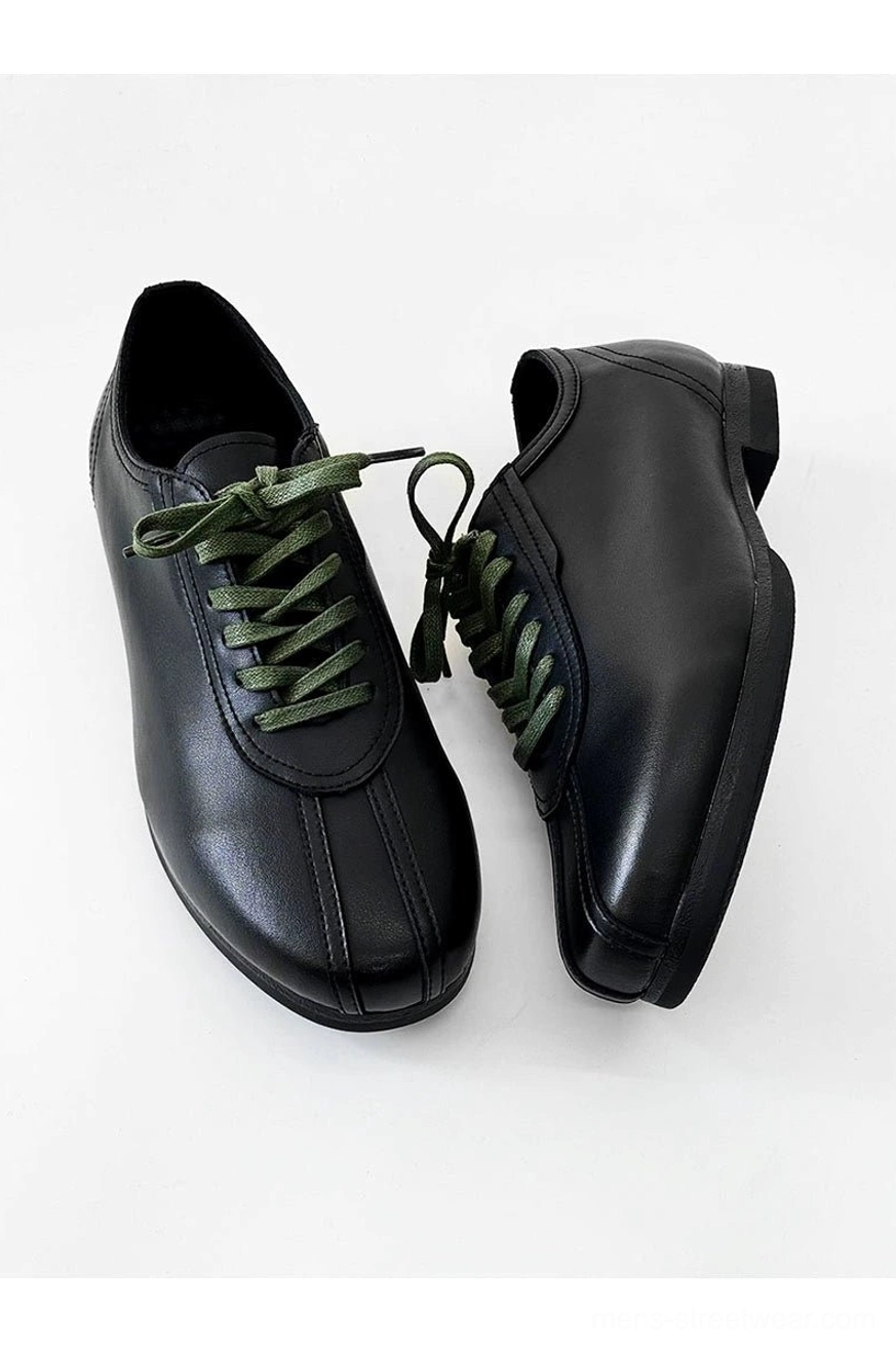 Black synthetic leather split-toe derby shoes with green laces designed for Korean fashion, Acubi outfits, and casual city wear