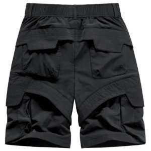 Rear view of black tactical cargo shorts showing layered back utility pockets, structured stitching, and durable lightweight technical streetwear fabric