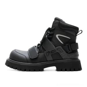 Black tactical harness boots shown from the left side with matte PU leather, front laces, hook-and-loop straps, reflective side detail, and chunky serrated lug sole