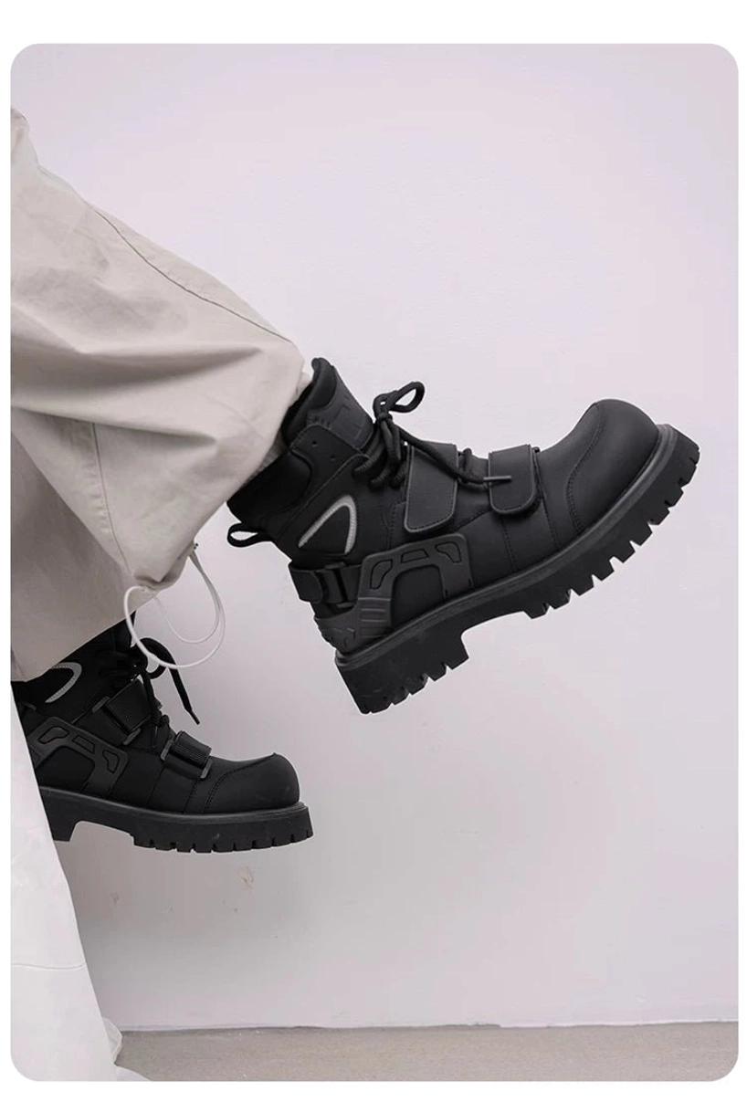 Rear side view of a lifted black tactical harness boot with reflective emblem, lace-up fastening, hook-and-loop straps, and chunky anti-slip outsole