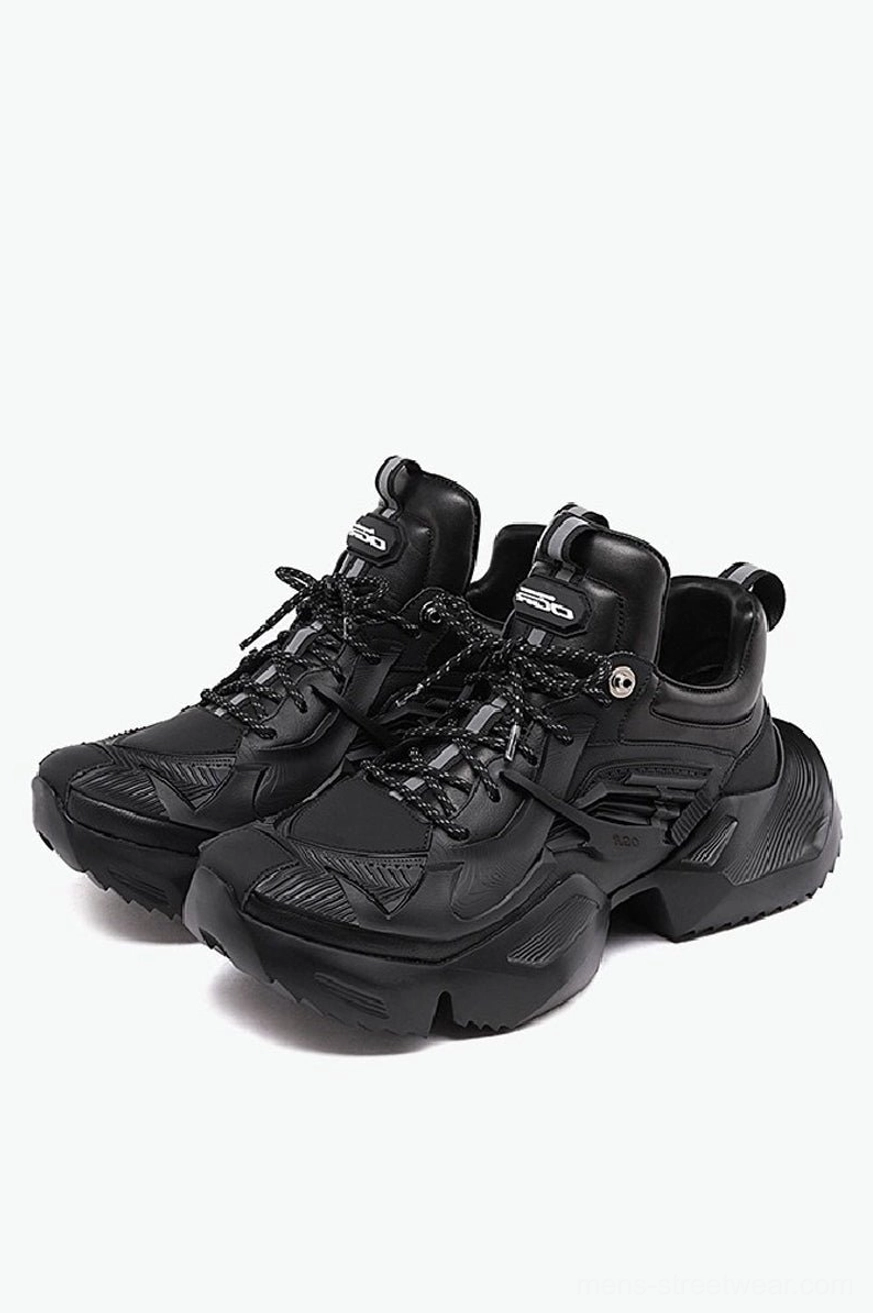 Pair of black tactical platform hiking sneakers with chunky rugged outsole, matte artificial leather upper, reflective laces, and techwear streetwear design