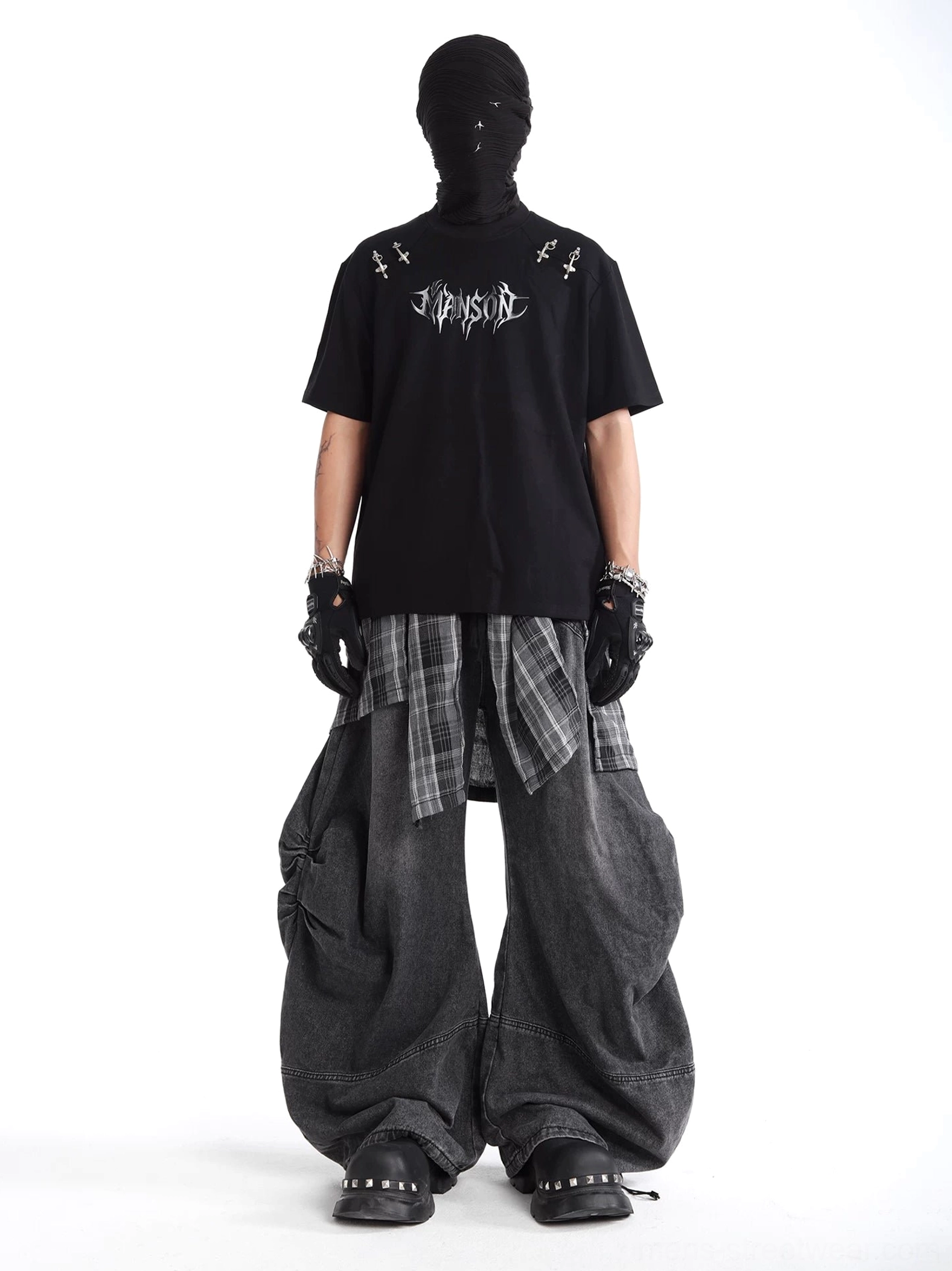 Exaggerated black wide leg plaid jeans with layered gray tartan waist panel and relaxed balloon fit for Seoul street fashion