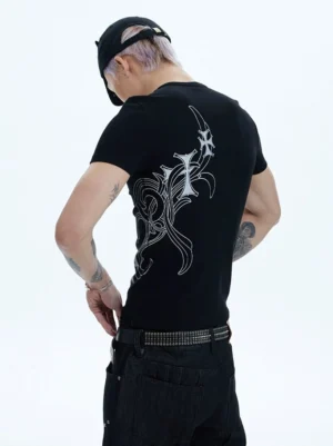 Black tattoo graphic slim-fit T-shirt shown from the rear three-quarter view with a silver tribal-inspired tattoo print across the upper back