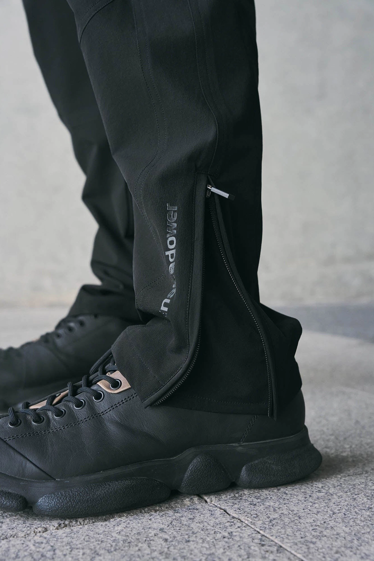 Black tech crinkled track pants product image for Korean streetwear and modern urban utility styling