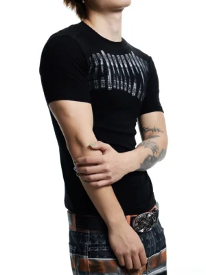 Side close-up of black fitted short sleeve T-shirt with silver teeth chest graphic and crew neck