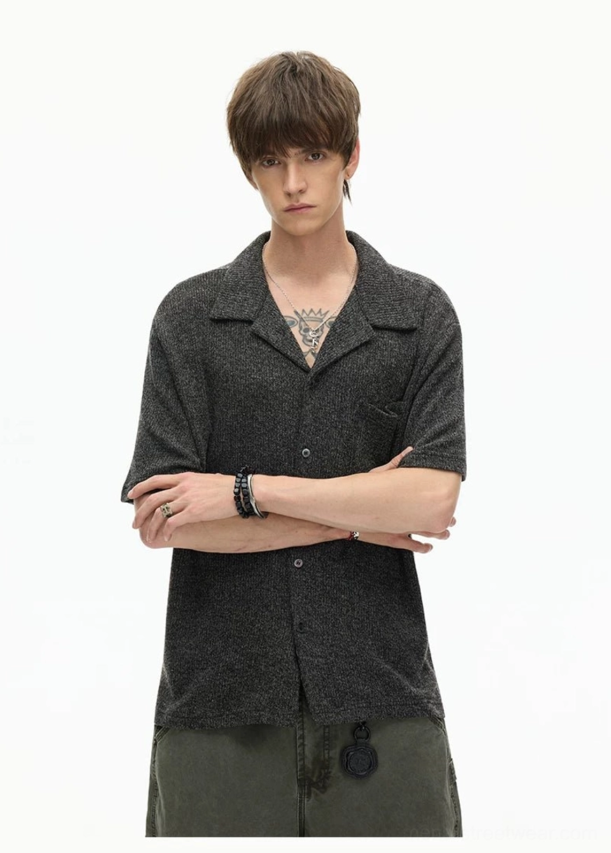 Black textured camp collar shirt product image with relaxed boxy fit, button front, and minimalist Seoul streetwear styling