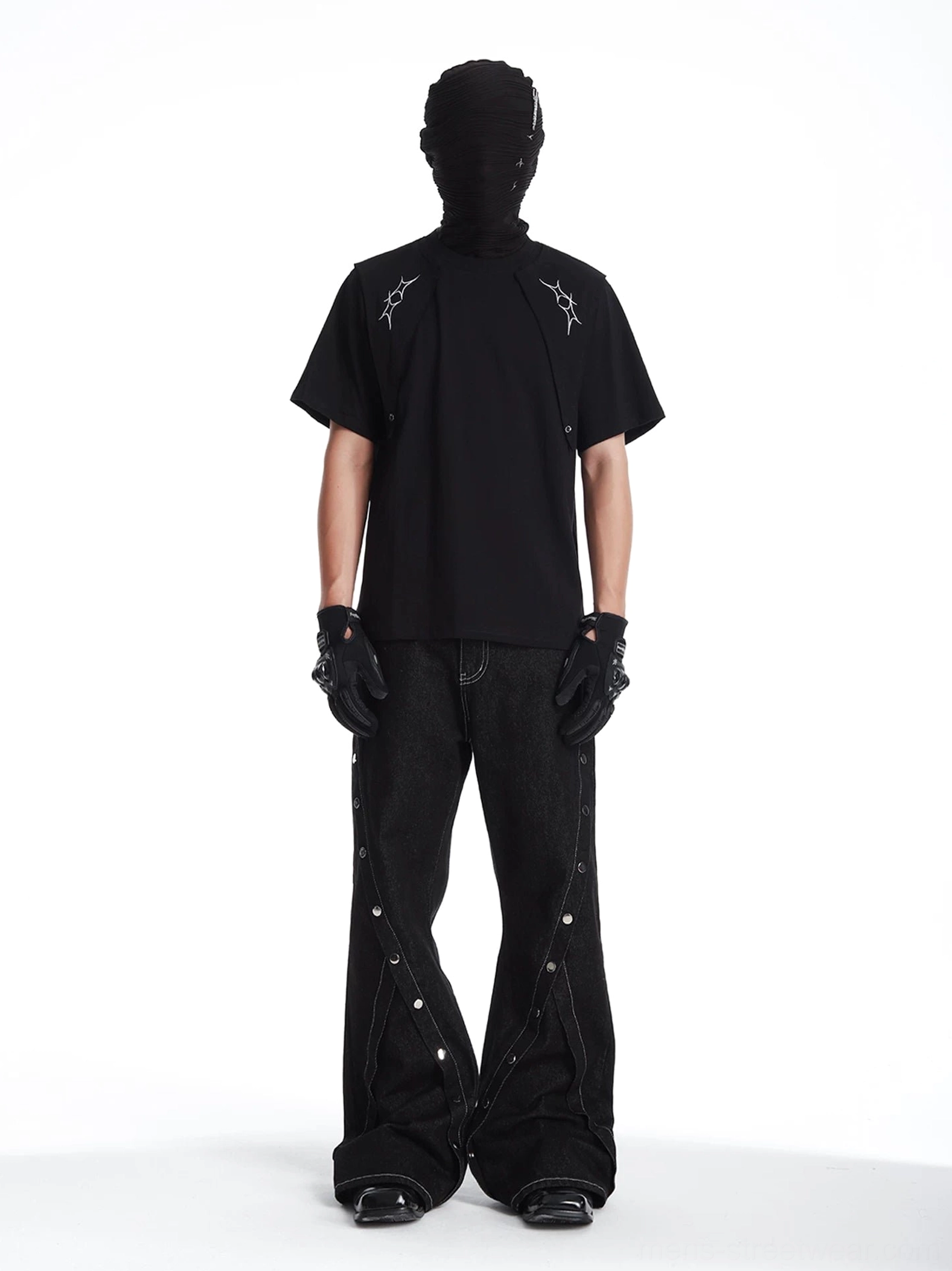 Rear full outfit view of black thorn embroidered layered t-shirt with deconstructed wide leg denim pants