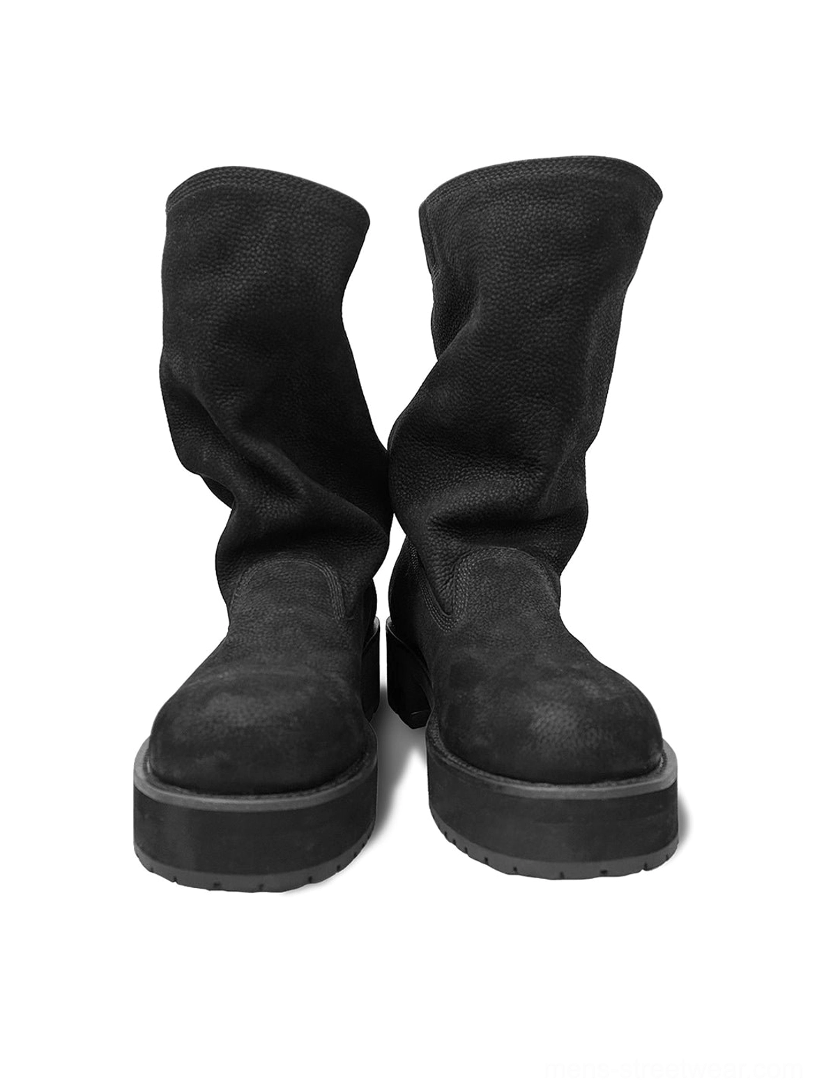 Front product view of matched pair of black tumbled leather slouch mid-calf boots with chunky block soles