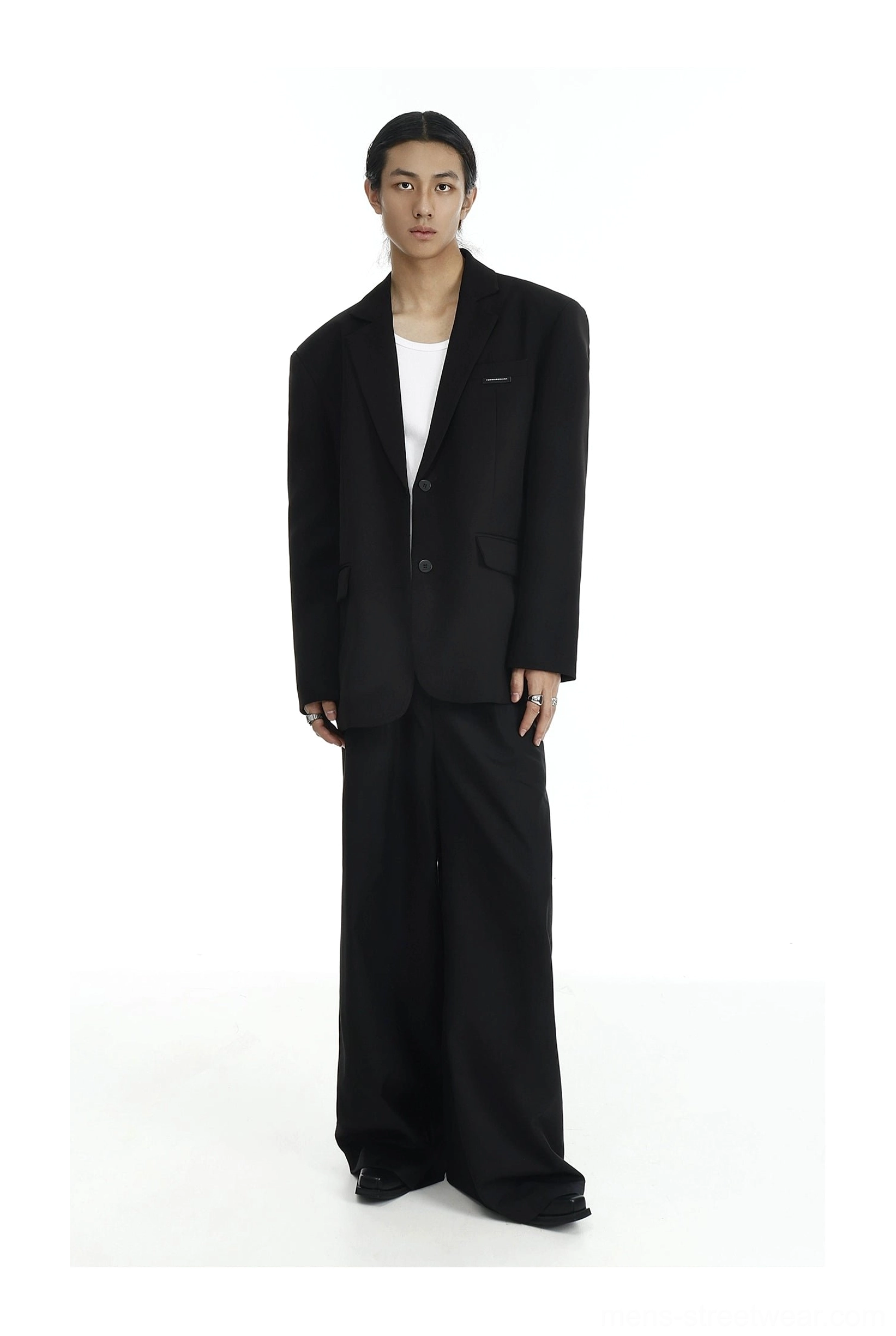 Black two-button blazer with white crew neck T-shirt and high-waisted wide-leg trousers in Seoul fashion styling