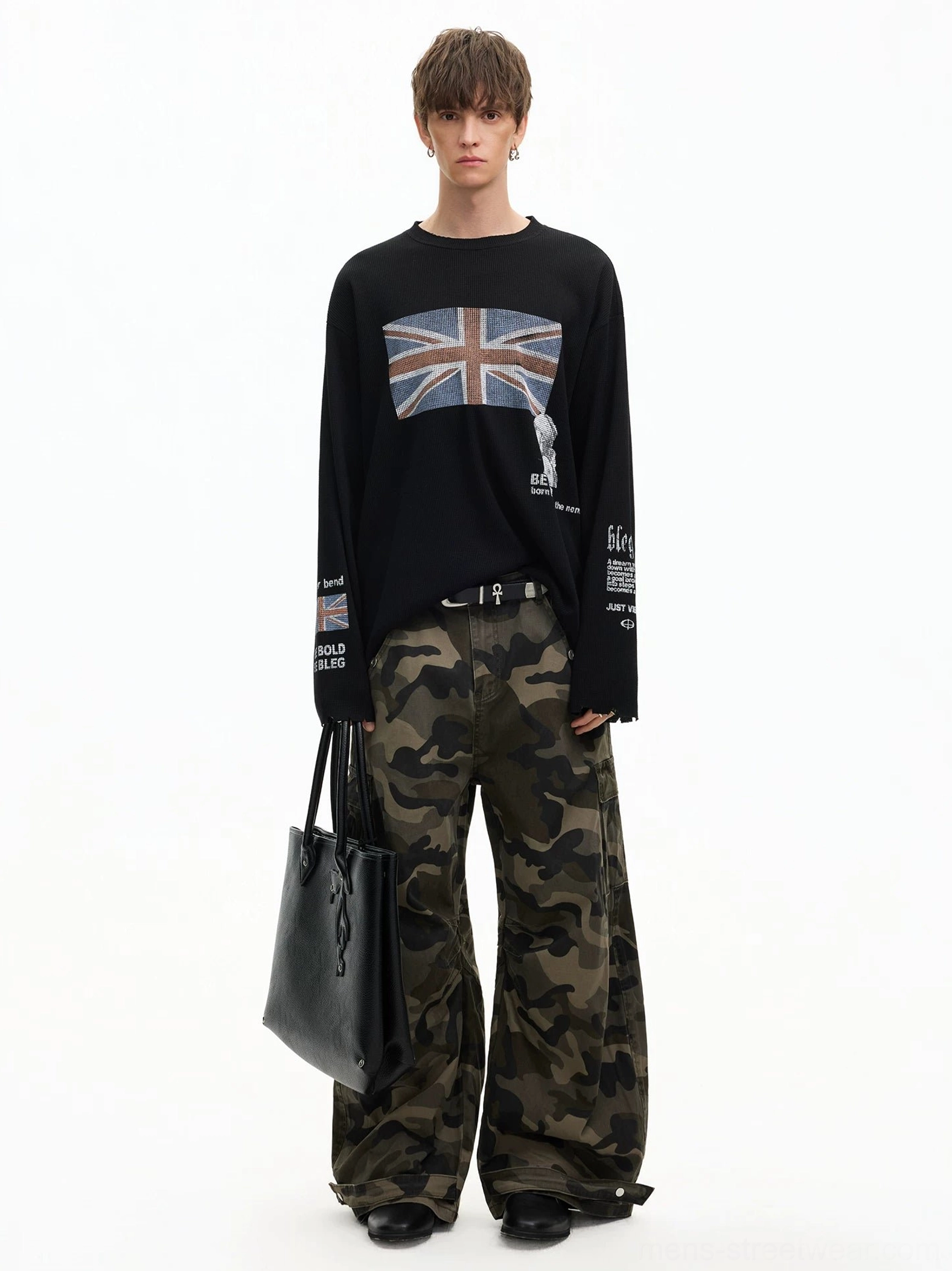 Black Union Jack graphic long sleeve streetwear tee styled with camouflage cargo pants and black tote bag