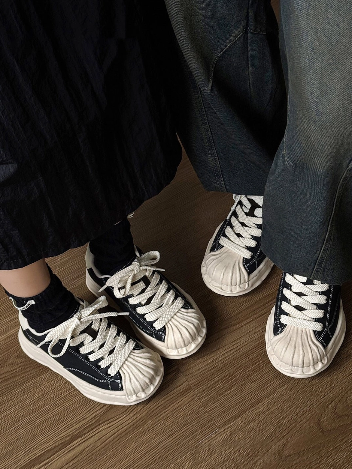 Black unisex distressed shell-toe court sneakers for Acubi style, Korean fashion, and everyday streetwear