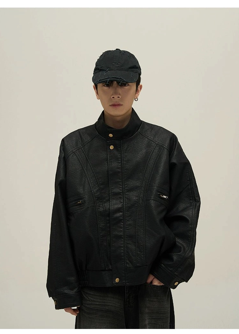Black vintage faux leather stand collar bomber jacket front flat lay showing snap buttons and zippered pockets