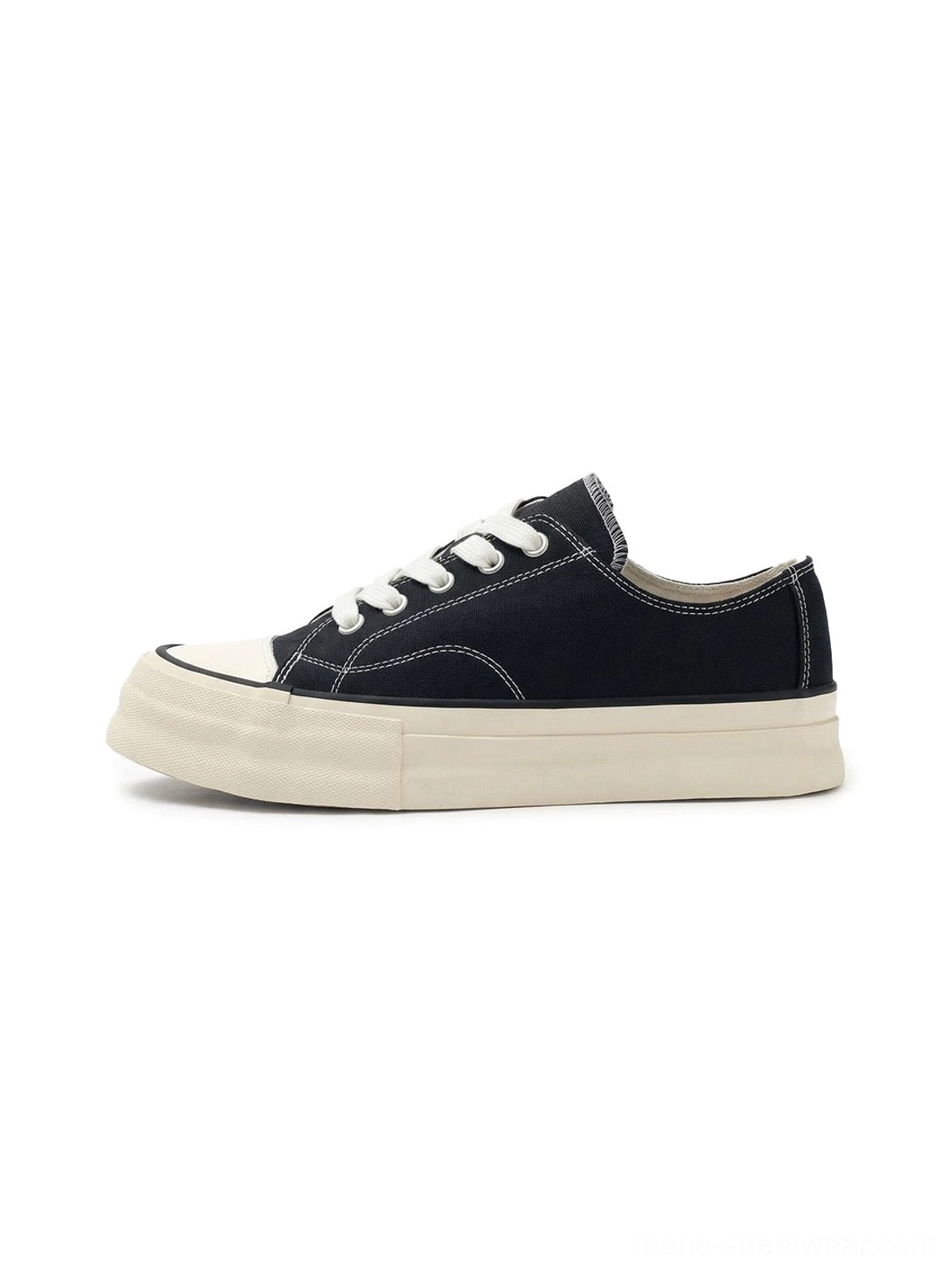 Black vulcanized canvas platform low-top sneakers with off-white rubber sole and classic round toe cap side view