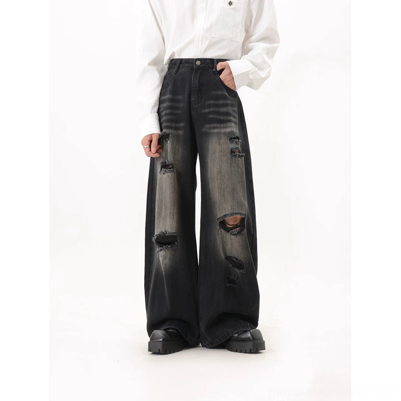 Black washed extra wide leg distressed jeans front three-quarter right view with grey gradient wash and ripped thigh detailing