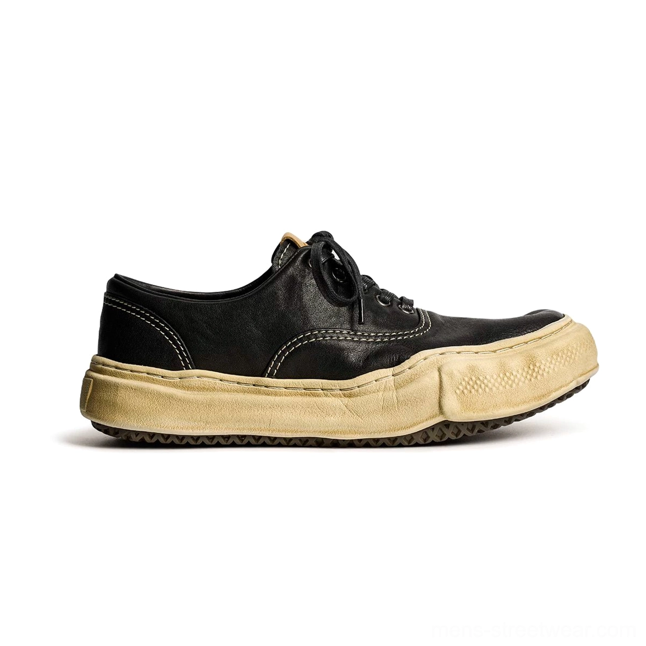 Black washed leather retro sneakers with distressed finish, thick off-white dissolved soles, classic lace-up construction, and urban streetwear appeal