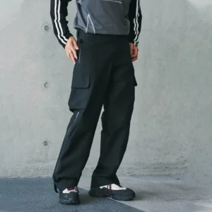 Black waterproof techwear cargo pants shown in a lower-body front view with large side pockets and ankle zippers