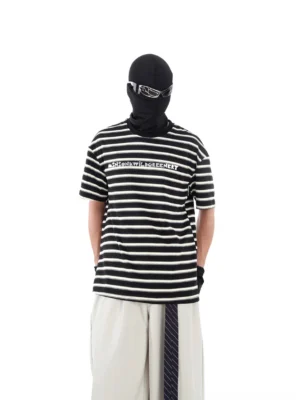 Front view of black and white horizontal striped oversized streetwear T-shirt with subtle chest lettering graphic and relaxed casual silhouette