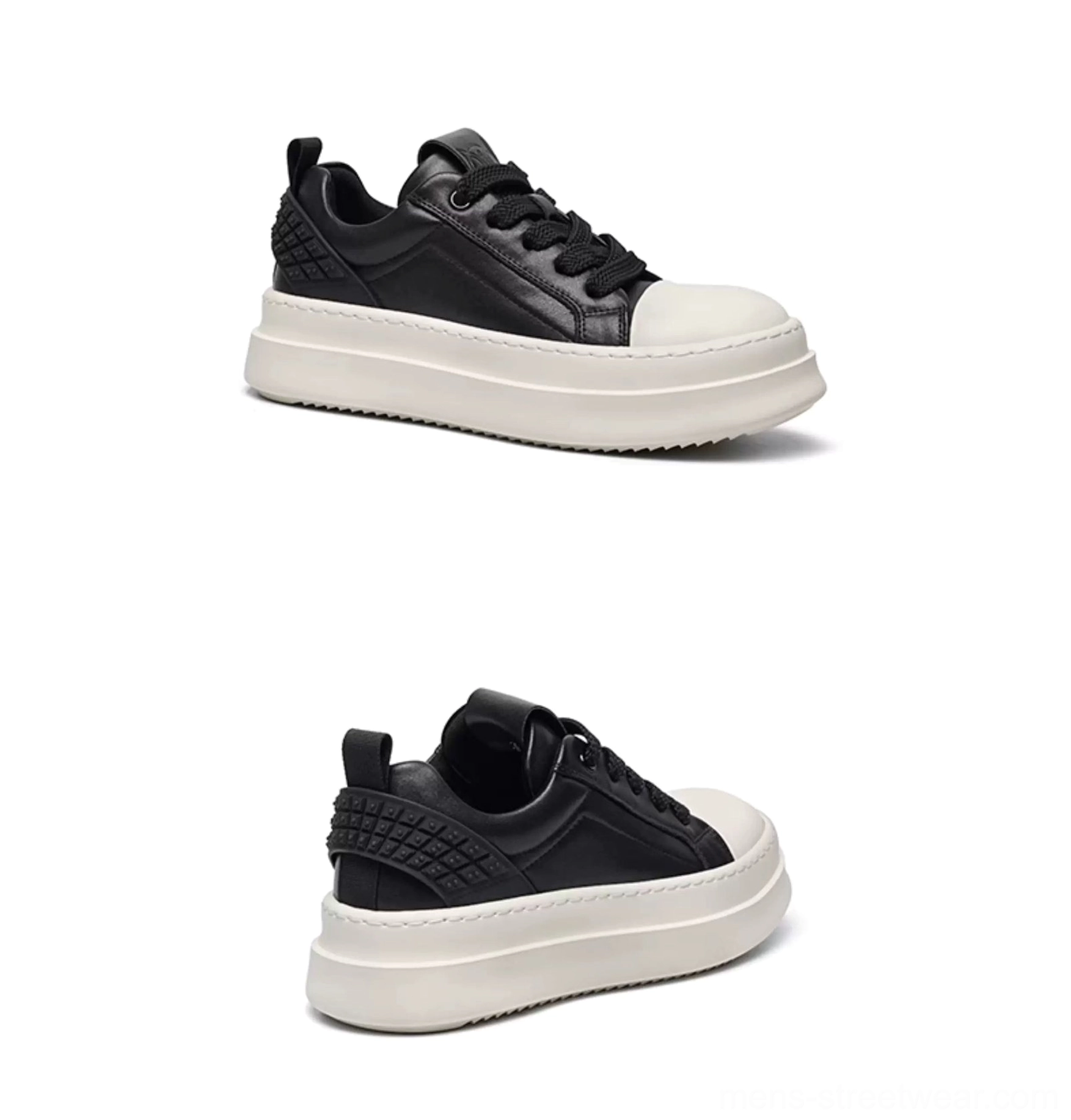 Black and white low-top platform sneakers shown from the rear three-quarter angle with lace-up closure and heel pull tab