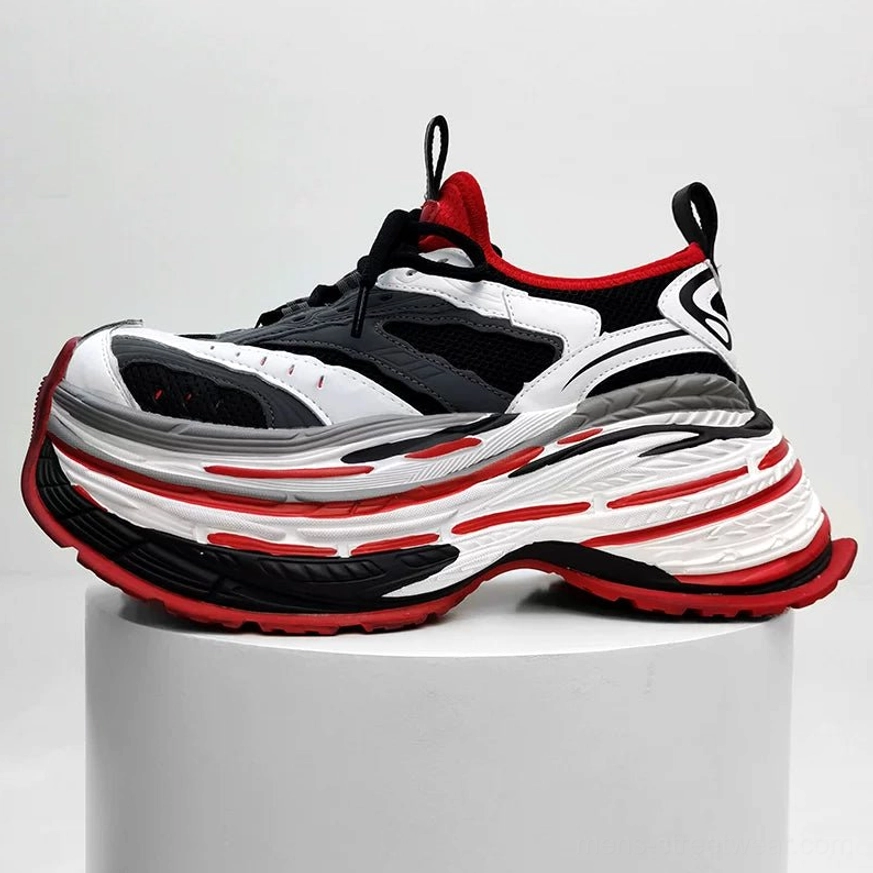 Black white and red chunky platform running sneakers with spliced mesh leather upper and bold layered sole