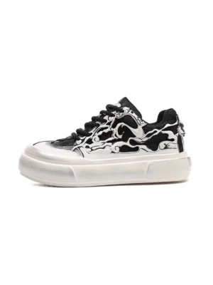 Black white Tai Chi panda chunky platform sneakers with graphic printed upper, lace-up closure, and elevated off-white sole