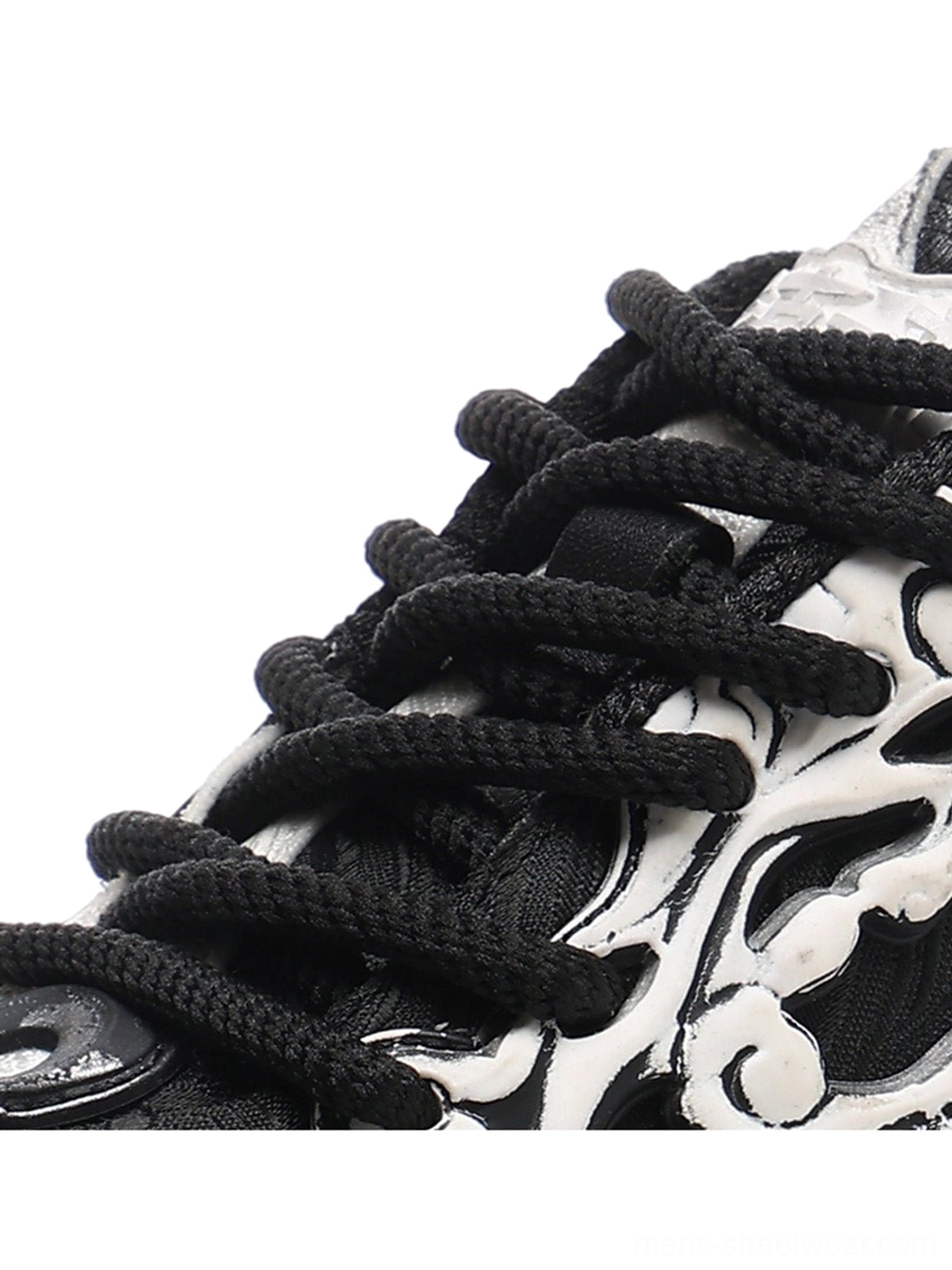 Black white Tai Chi panda chunky sneakers with contrasting panels, oversized platform profile, and distinctive East Asian streetwear design