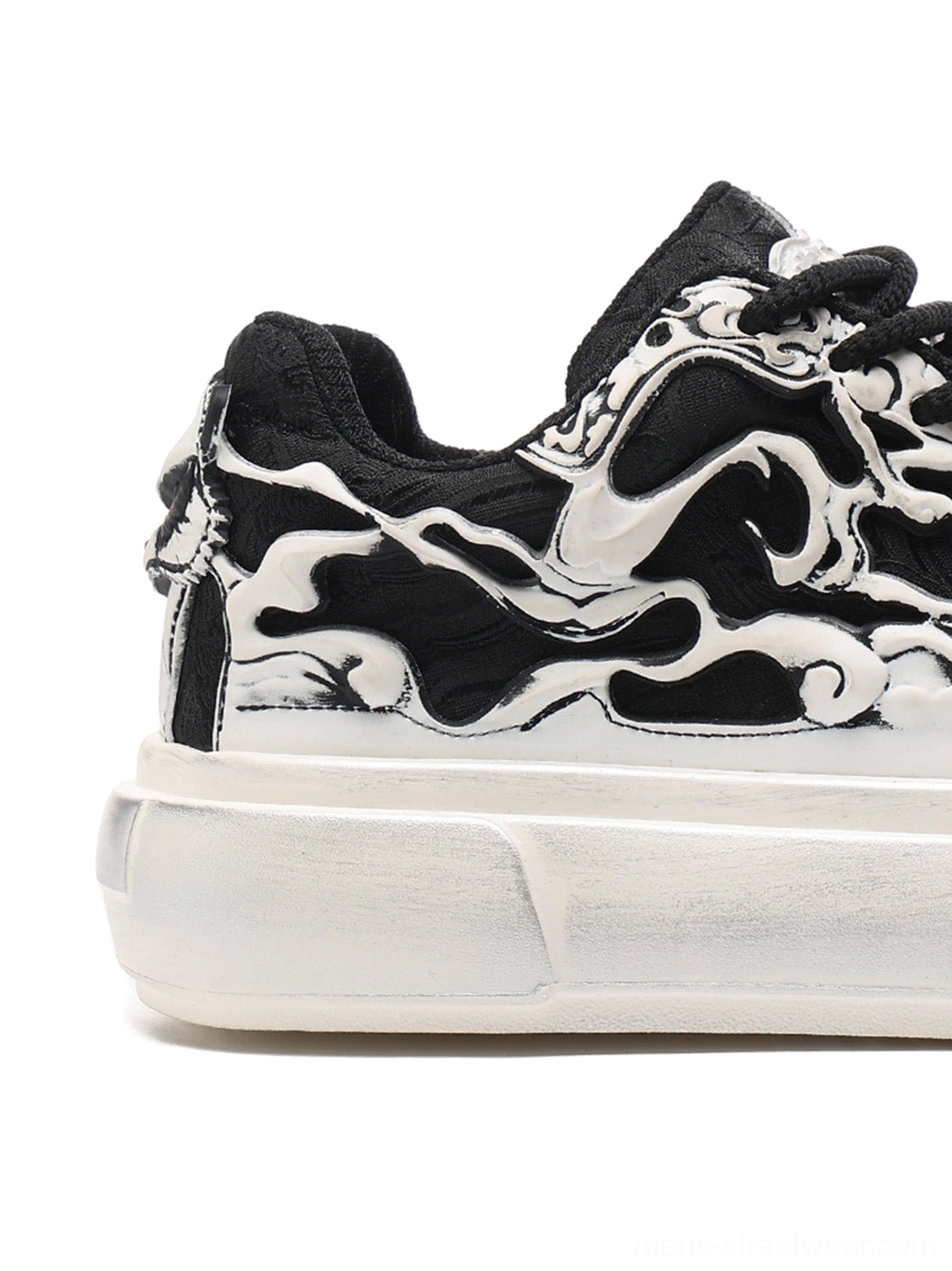Black white Tai Chi panda platform sneakers with bold graphic detailing, layered upper construction, and futuristic chunky streetwear shape