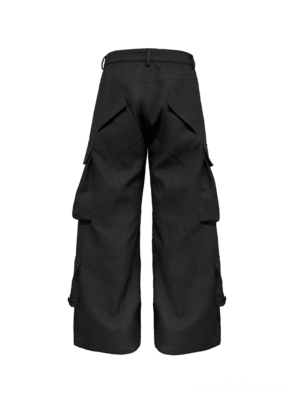 Rear view of black wide-leg cargo trousers with utility flap pockets across the hips and calves