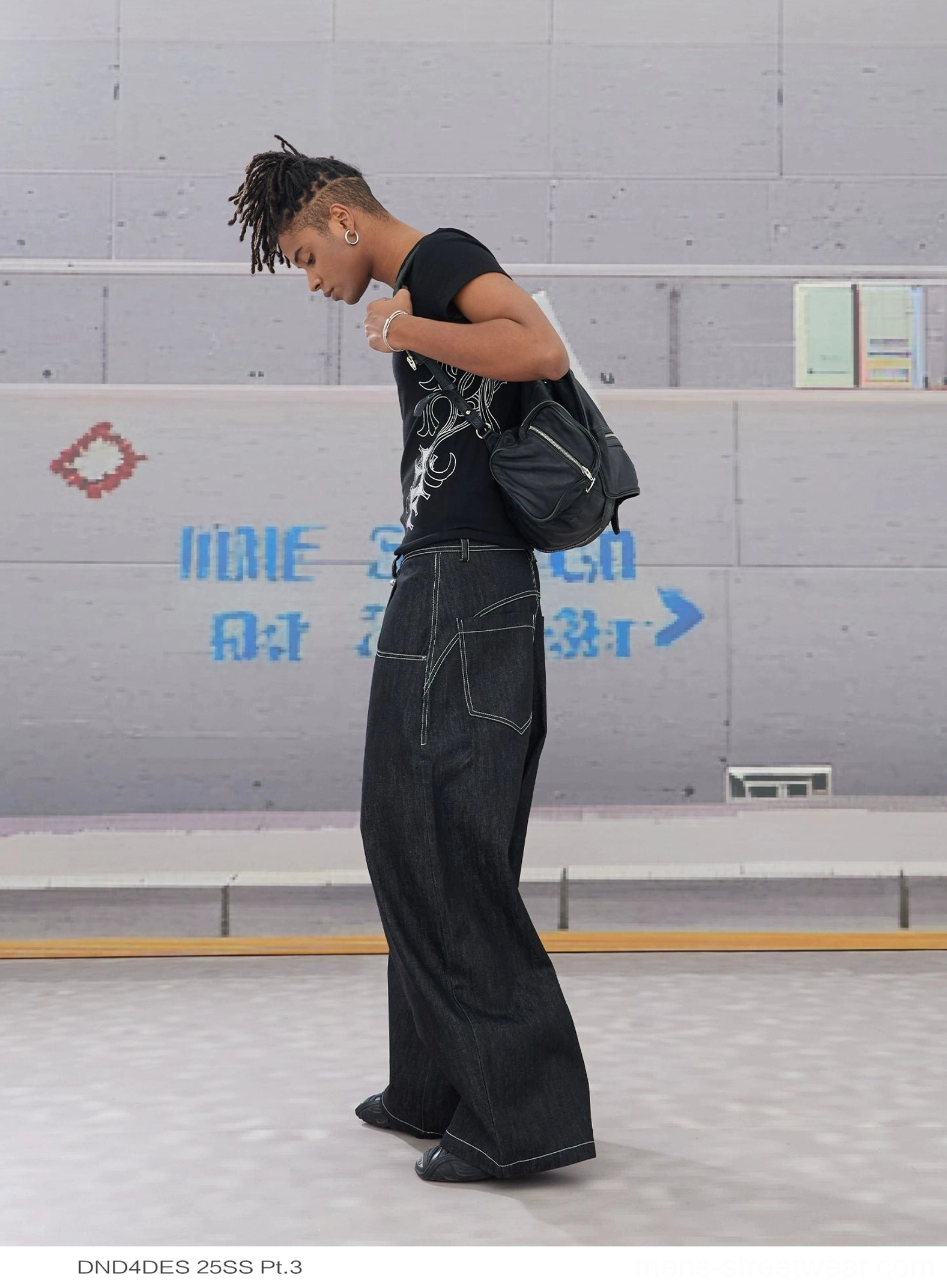 Black wide leg hook closure contrast stitch jeans dark wash denim streetwear detail view