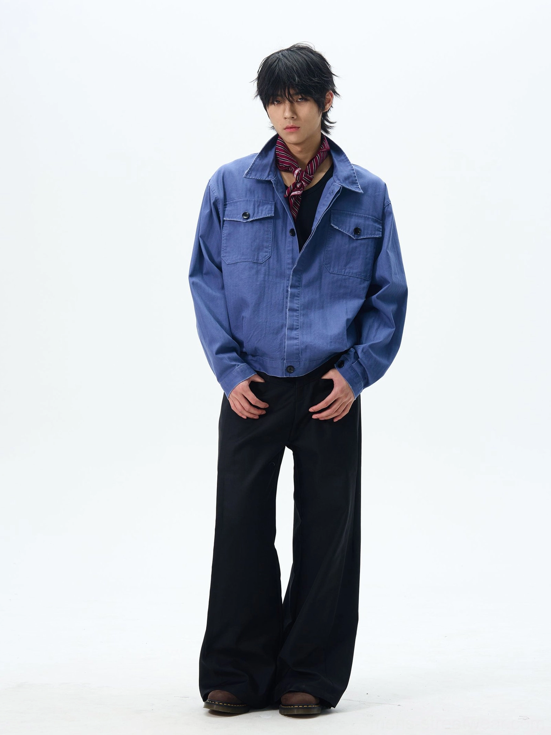 Black wide-leg skater pants shown from the front with a clean tailored waistband and relaxed Korean streetwear silhouette