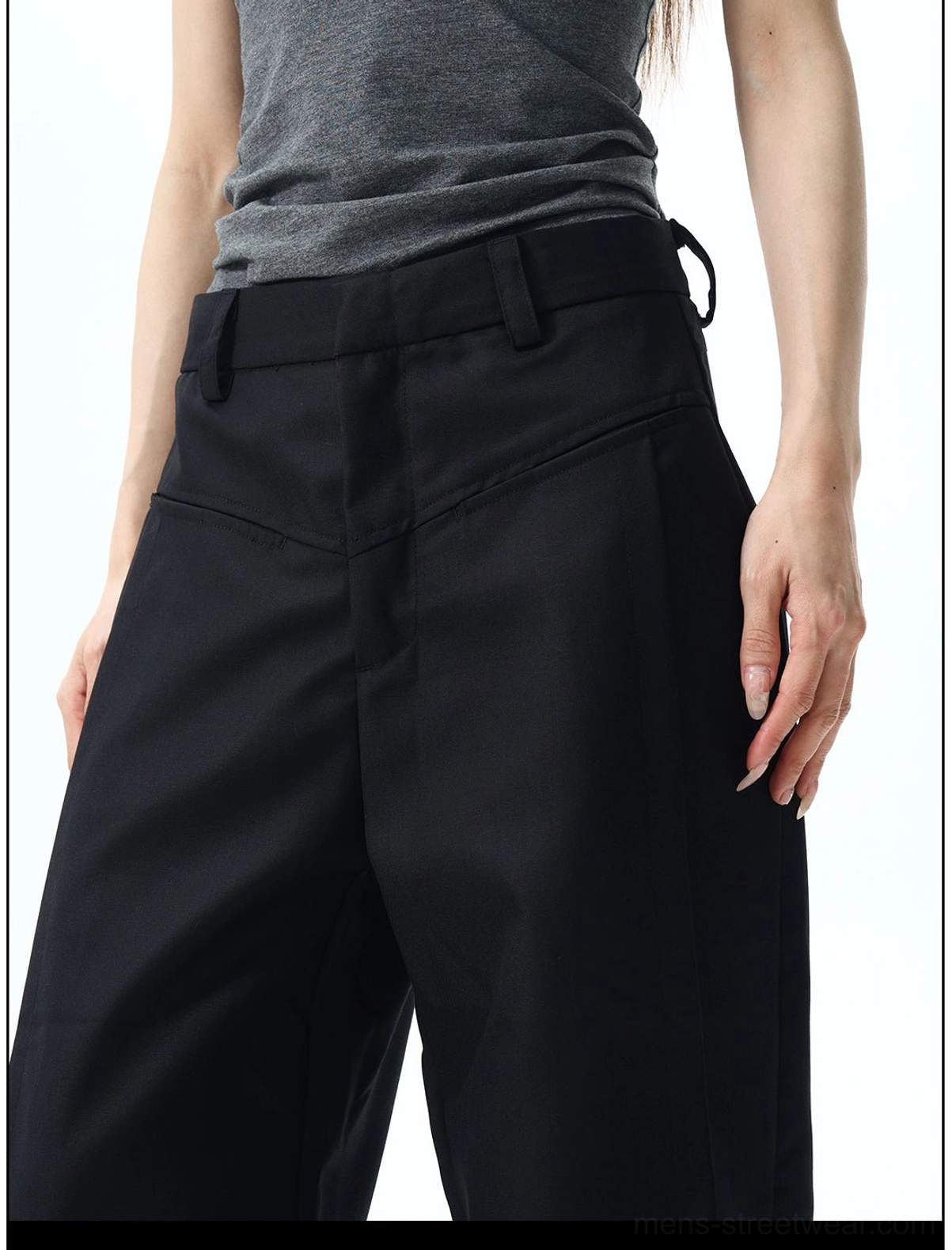 Black wide-leg skater pants styled as versatile Korean streetwear trousers with an oversized relaxed silhouette