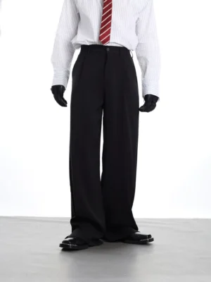 Black wide-leg tailored suit trousers shown from the front with a clean waistband, smooth matte fabric, and relaxed Korean streetwear silhouette