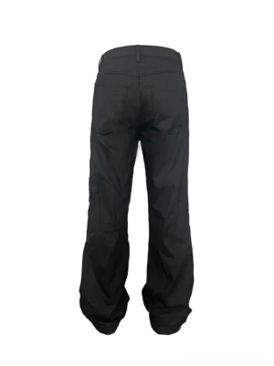 Rear view of black wide leg utility pants with two back patch pockets and relaxed long stacked hem
