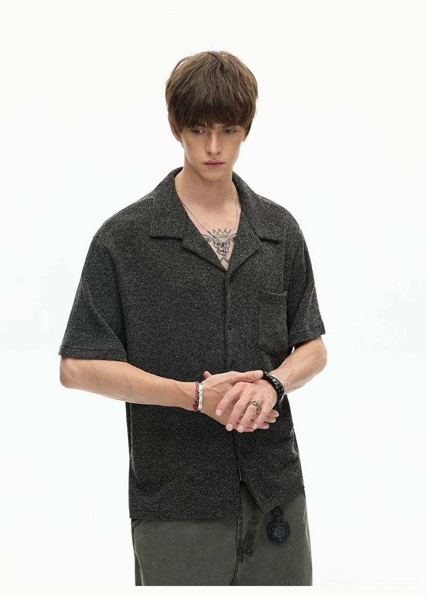 Black woven textured camp collar shirt styled with olive cargo pants in a relaxed East Asian streetwear outfit