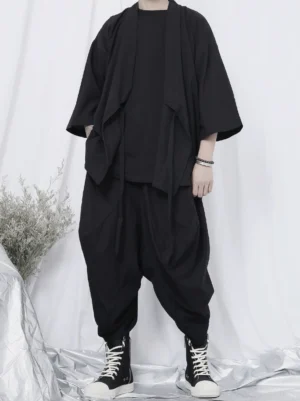 Black wrap kimono shirt in an oversized Korean streetwear outfit with wide sleeves, side tie straps, loose harem pants, and monochrome styling