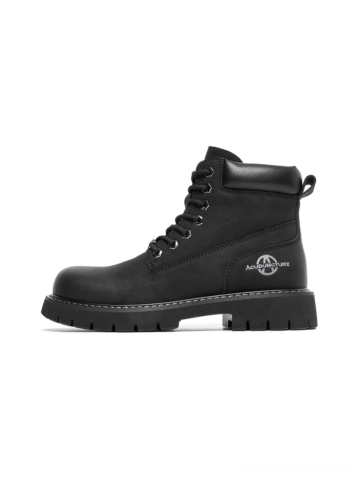 Black and yellow streetwear work boots with streamlined silhouette and bold textured rubber outsole