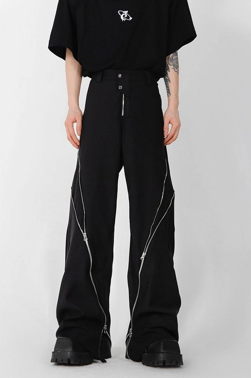 Black zipper slit wide leg trousers shown in a full front view with a high-waisted button closure, loose fit, and minimalist Korean streetwear design