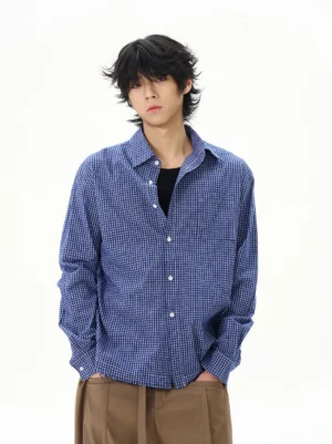 Blue gingham cotton long sleeve shirt in relaxed Seoul streetwear fit front studio view