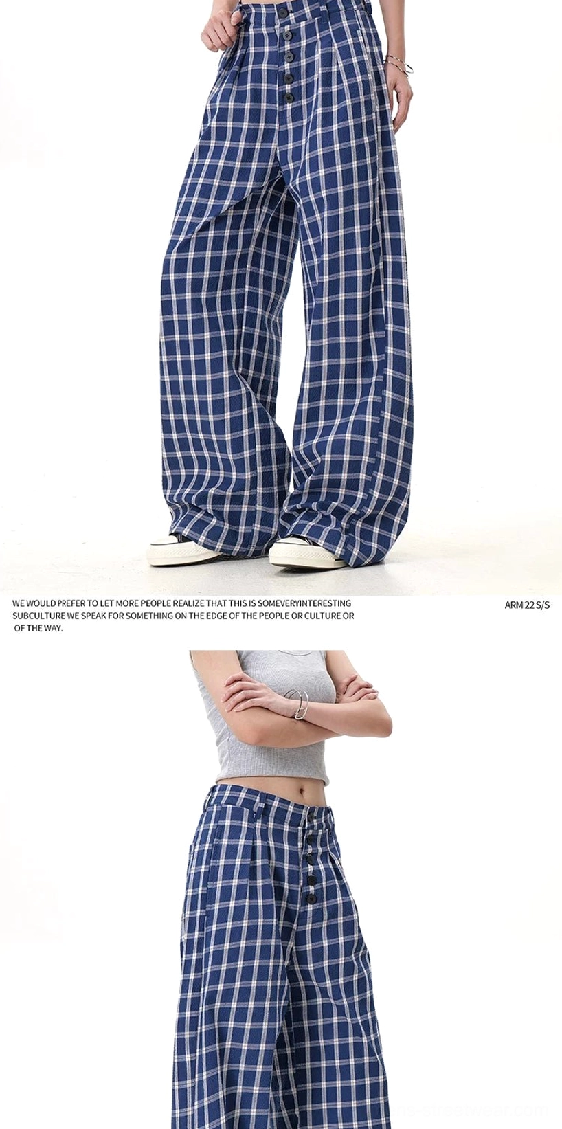 Blue grid plaid high-waisted button-front pants with a casual wide-leg fit shown in a contemporary Seoul fashion look