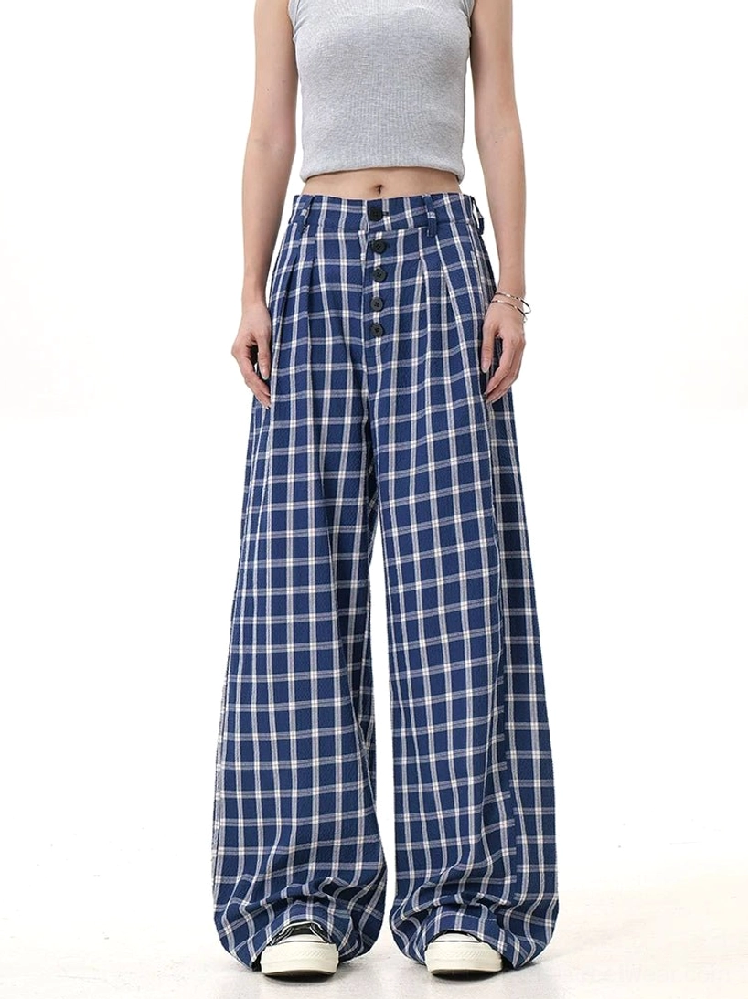 Blue plaid wide-leg trousers with a neat grid check pattern, high waist, and clean tailored fit shown from the front
