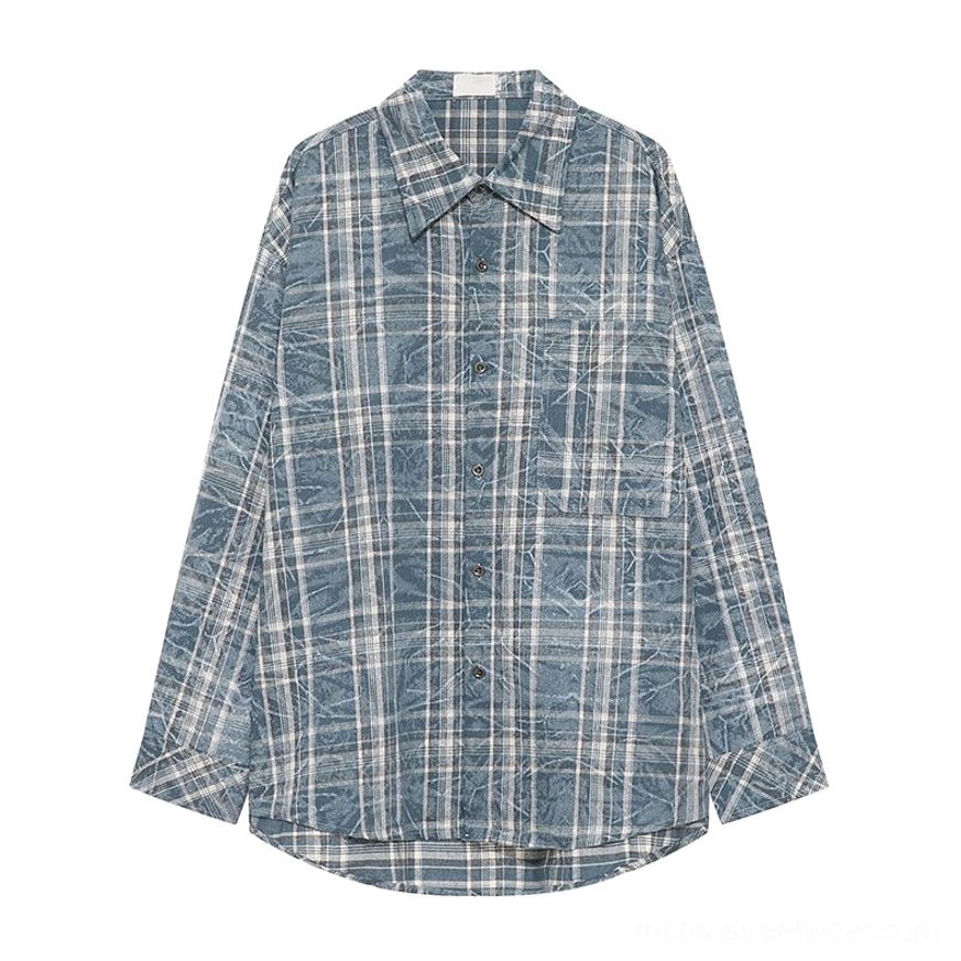 Blue plaid streetwear overshirt with relaxed oversized fit, washed texture, and versatile casual layering design