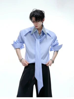 Blue rhinestone double collar long tie streetwear dress shirt worn with black wide-leg trousers front three-quarter view